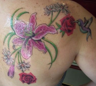 Awesome Lily Flower Tattoo Designs on Back for Girls