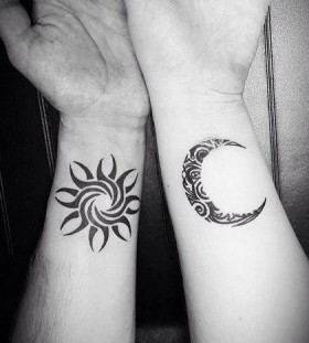 sun and moon on wrist couple tattoo