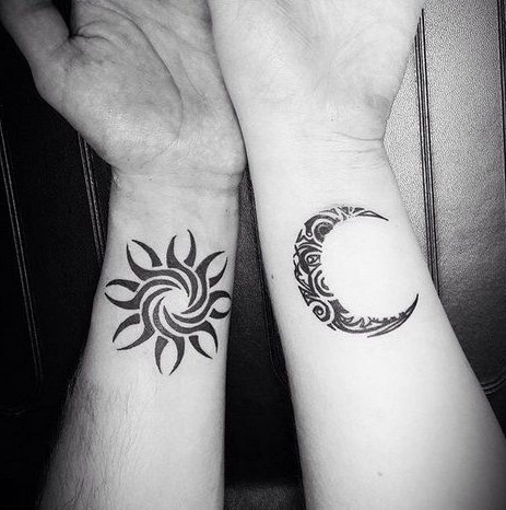 sun and moon on wrist couple tattoo