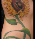 Beautiful Sunflower Tattoo Design on Rib for Girls