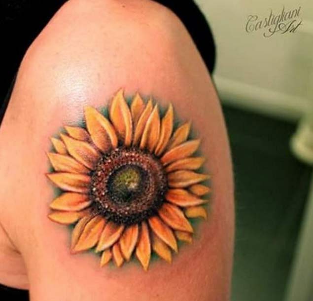 sunflower upper arm tattoo