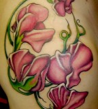 Amazing Sweet Pea Flowers Upper Arm Tattoo Design Idea