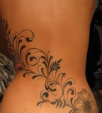 Amazing Swirly Tattoo on Girl's Back (NSFW)