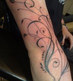 Awesome Full Arm Swirl Tattoo Design for Girls