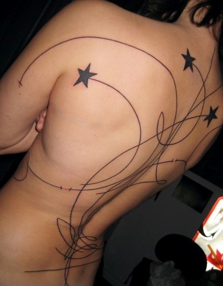 Georgeous Swirling Stars Tattoo on Women Back (NSFW)