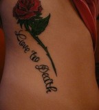 Rose And  Love Symbol Tattoo Design