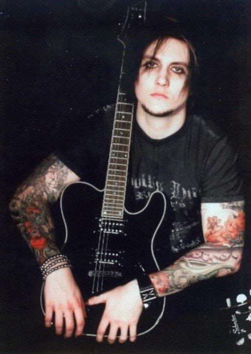 Synyster Gatess Holding Guitar Showing Tattoos
