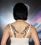 Black Tribal Tattoo Designs For Women