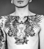 Hourglass Chest Tattoo Ideas Men by Sebastian Brade