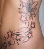 Beautiful Stars and Swirly Flowers Tattoo Design for Women - Rib to Hip Tattoo