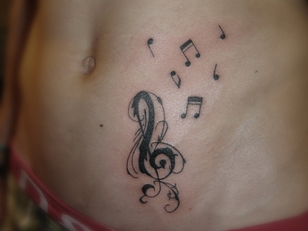 Creative Female Tattoo Designs – Music Notes Tattoo