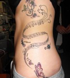Side Abdomen Music Tattoo Ideas