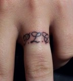 Charming Ring Finger Tattoo Design Picture