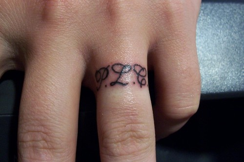 Charming Ring Finger Tattoo Design Picture