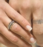 Sweet Scripture Tattoo Design on Ring Finger
