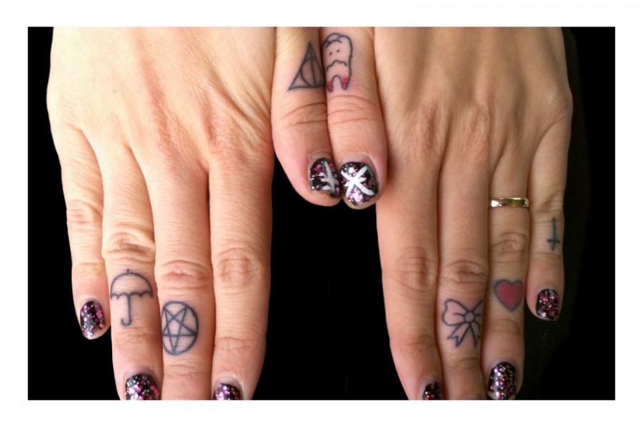 Mango Chutney Cute Shit Tattoo Design on Ring Finger