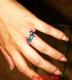 Unique Ring Finger Tattoo Design Pic