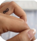 Tinkerbell Is A Superhero Themed Tattoo Design on Ring Finger