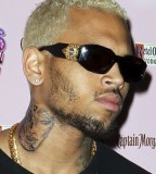 Chris Brown' Neck Tattoo of Battered Woman Face - Celebrity Tattoos