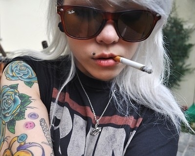 Cigarette Girl with Tattoo and Piercings