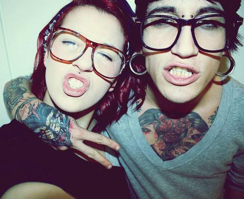 Couple Tattoo and Piercings