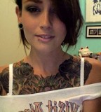 Beautiful Girl Lip Piercing and Chest Tattoo