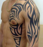 Black Tribal Tattoo Designs For Men on Half Body