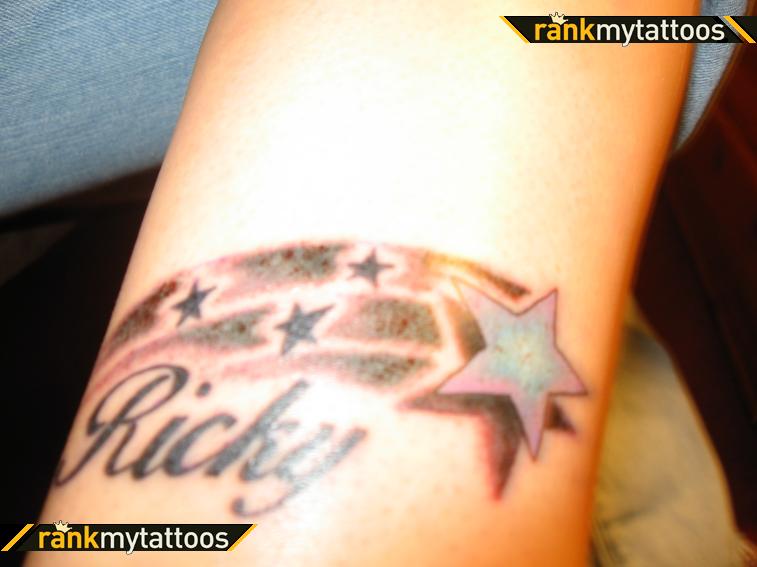 Impressive Shooting Star Shaped Tattoo Design Photo