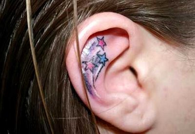 Shooting Star Shaped Girls Tattoo Design on Ear