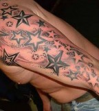 Full Shooting Star Shaped Tattoo Design on Arm for Men