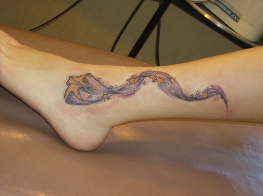 Awesome Shooting Stars Tattoo on Girls Foot