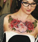 Girl with Wonderful Rose Tattoo Design on Chest