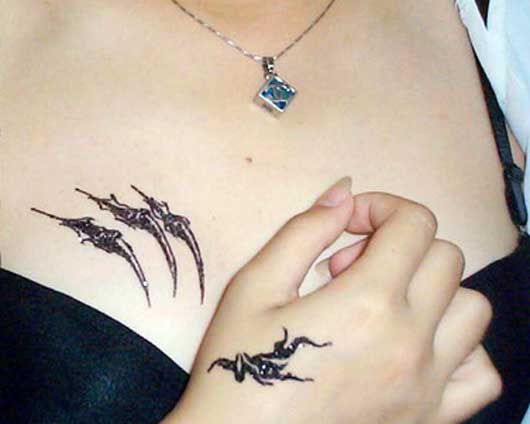 Cute Small Chest Tattoo Design for Women