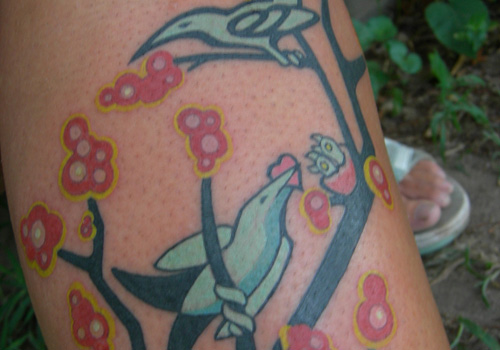 Wonderful Birds Symbolizing Family Tattoo Design Pic