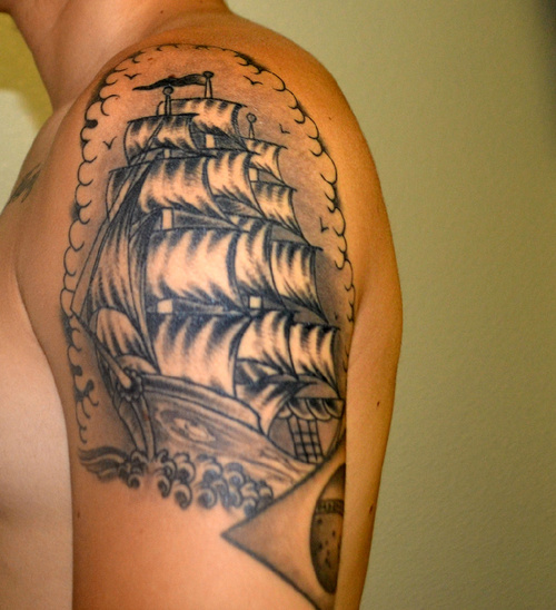 Cool Pirate Ship Tattoo on Left Upper-Arm by Full Circle Tattoo