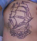 Roses and Pirate Ship Side-Rib Tattoo Design for Women