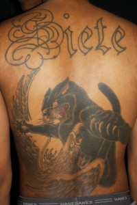 Animal Tattoo for Men – Back Tattoo Design “The Struggle”