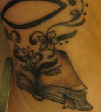 First And Last Tattoo - Flowery Book Tattoo Design