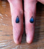 Tear Drop Tattoo on Fingers