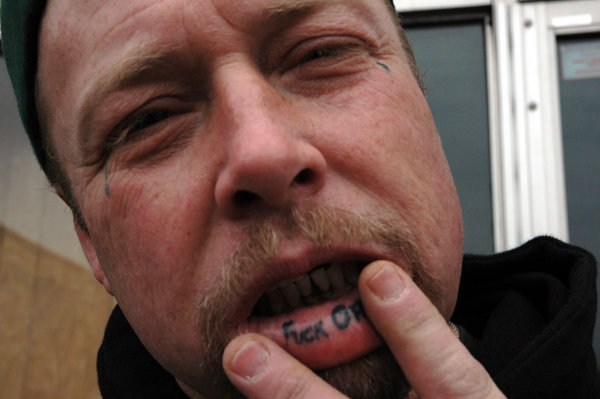 Teardrop And Inside Lip Tattoos For Man