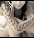 Girl's Arm Fractal Tattoo