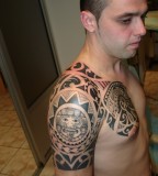 Cool Tribal Tattoo Design on Arm for Men