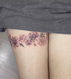 thigh garter flower tattoo