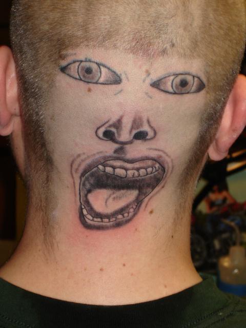 Bold, Dumb, and Funny Guy Face Tattoo on Head - | TattooMagz › Tattoo