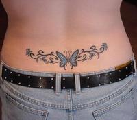 Artistic Butterfly Tramp Stamp Tattoo On The Lower Back