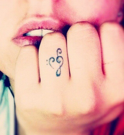 Finger With Bass And Treble Clef Heart Tattoo