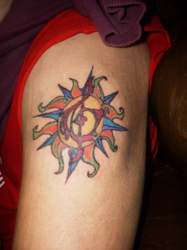 Sun Treble Clef Tattoo – Upper Arm Tattoo Ideas