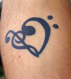 Heart Treble Bass Clef Tattoo Design