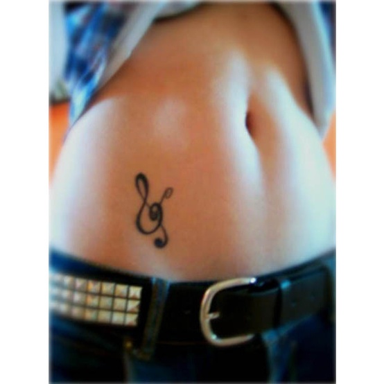 Small and Cute Treble Clef Tattoo for Women