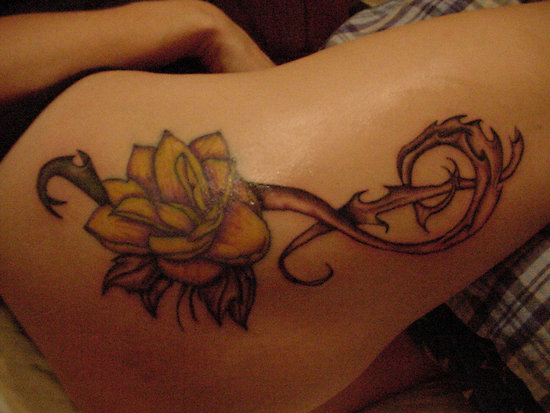 Lotus With Treble Clef Tattoo for Women